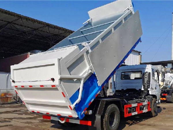 國六東風(fēng)153壓縮對(duì)接翼展自卸垃圾車